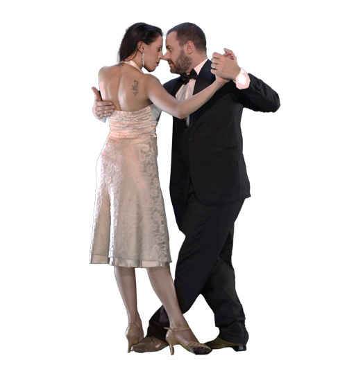 Due persone ballano il tango Buena Onda in abiti formali; la donna con un abito leggero e l'uomo con un abito nero e un papillon.